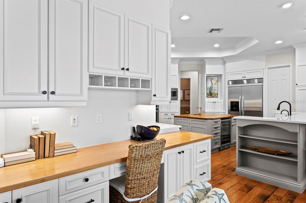 625 Balibay Road Apollo Beach, FL 33572 - Photo 7 of 51 a kitchen with stainless steel appliances granite countertop a sink stove and cabinets