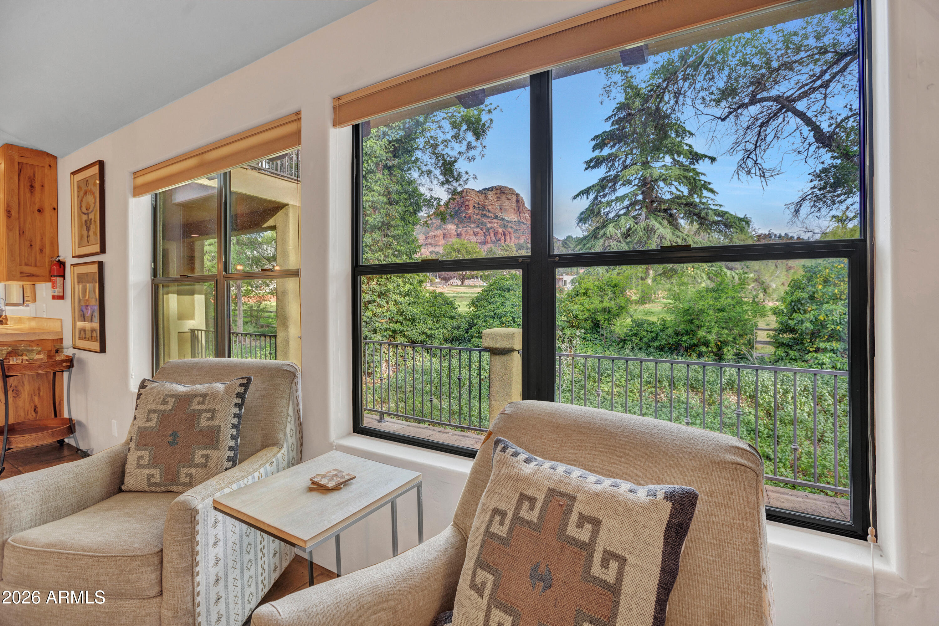 55 Ranch House Circle Sedona, AZ 86336 - Photo 15 of 61 a living room with furniture and a large window