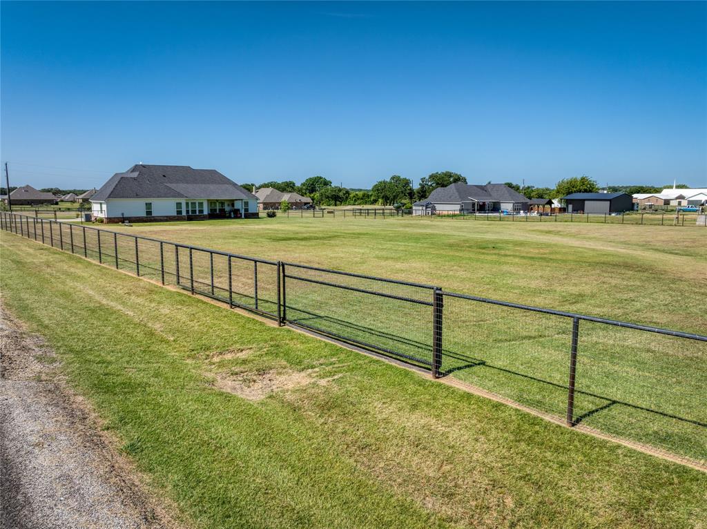152 Katy Ranch Drive Weatherford, TX 76085 - Photo 33 of 39 Piped Fenced Yard + Gate