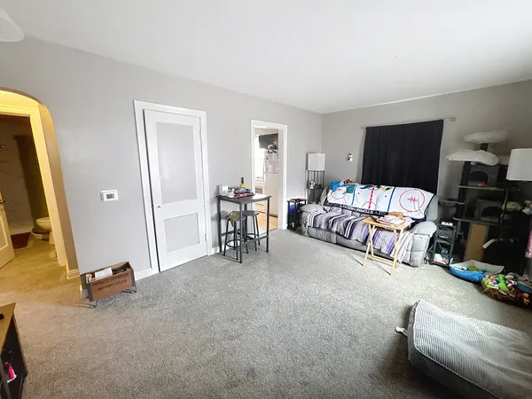 a bedroom with furniture and a couch