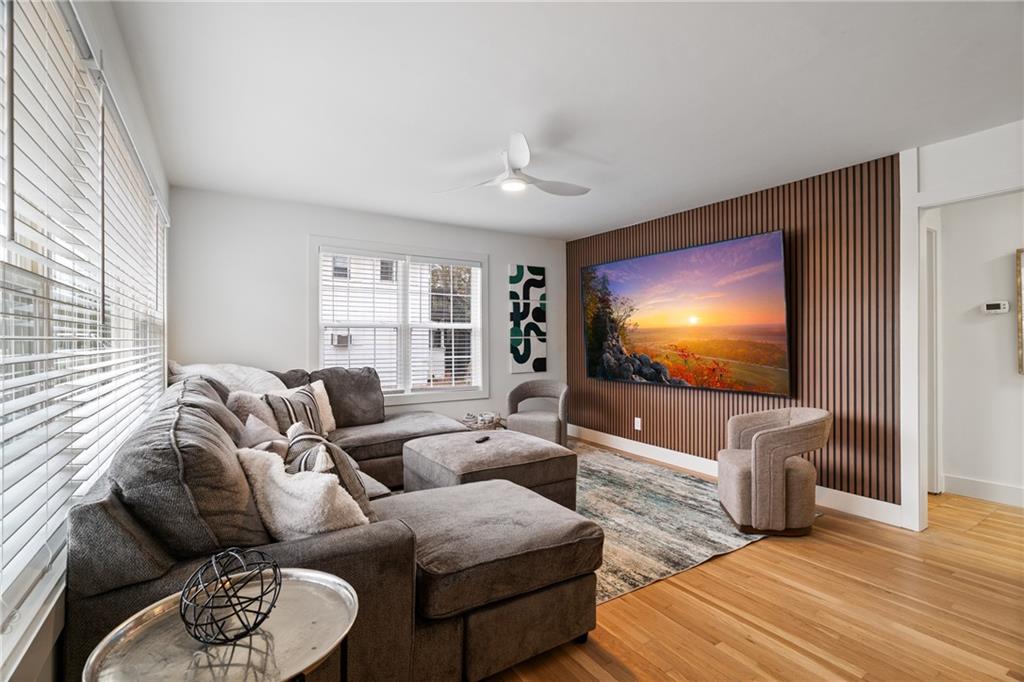 2790 Sardis Street Kennesaw, GA 30144 - Photo 11 of 49 a living room with furniture and a flat screen tv