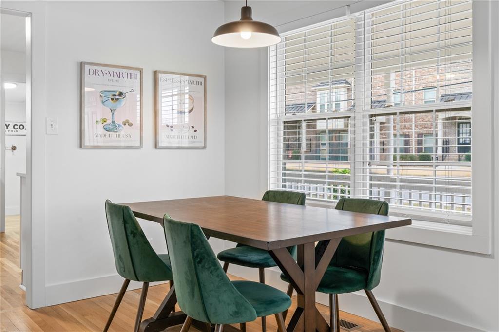 2790 Sardis Street Kennesaw, GA 30144 - Photo 15 of 49 a view of a dining room with furniture window and wooden floor