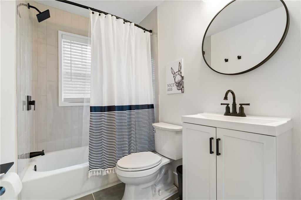 2790 Sardis Street Kennesaw, GA 30144 - Photo 25 of 49 a bathroom with a sink toilet and shower