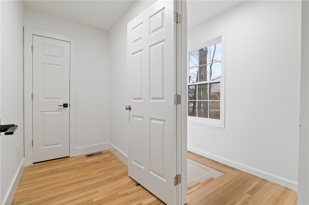 2790 Sardis Street Kennesaw, GA 30144 - Photo 27 of 49 a view of a hallway with wooden floor and entryway