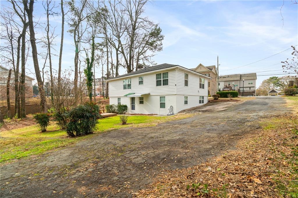2790 Sardis Street Kennesaw, GA 30144 - Photo 38 of 49 a view of a house with a big yard