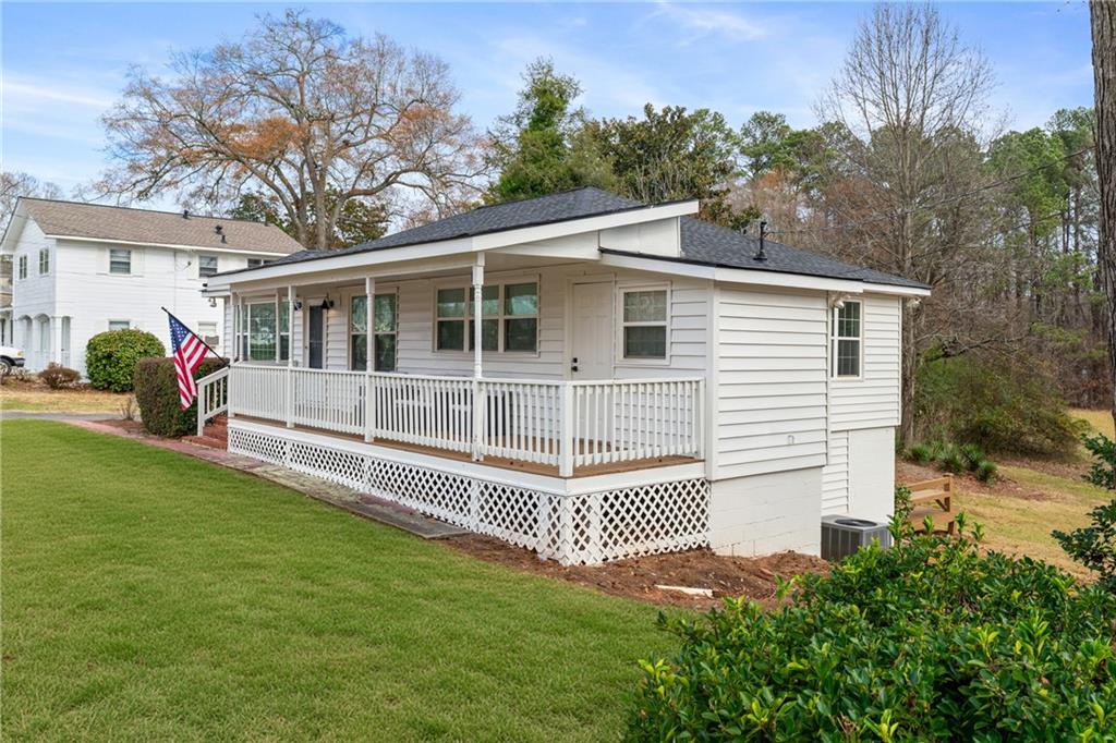 2790 Sardis Street Kennesaw, GA 30144 - Photo 4 of 49 a front view of a house with a garden