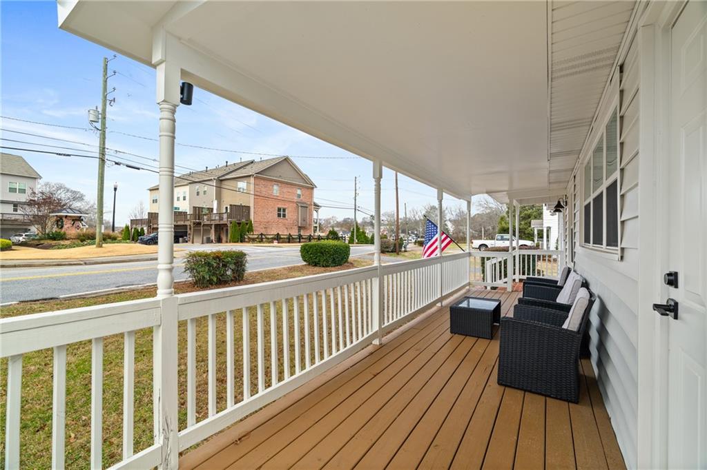2790 Sardis Street Kennesaw, GA 30144 - Photo 9 of 49 a view of a balcony with wooden floor