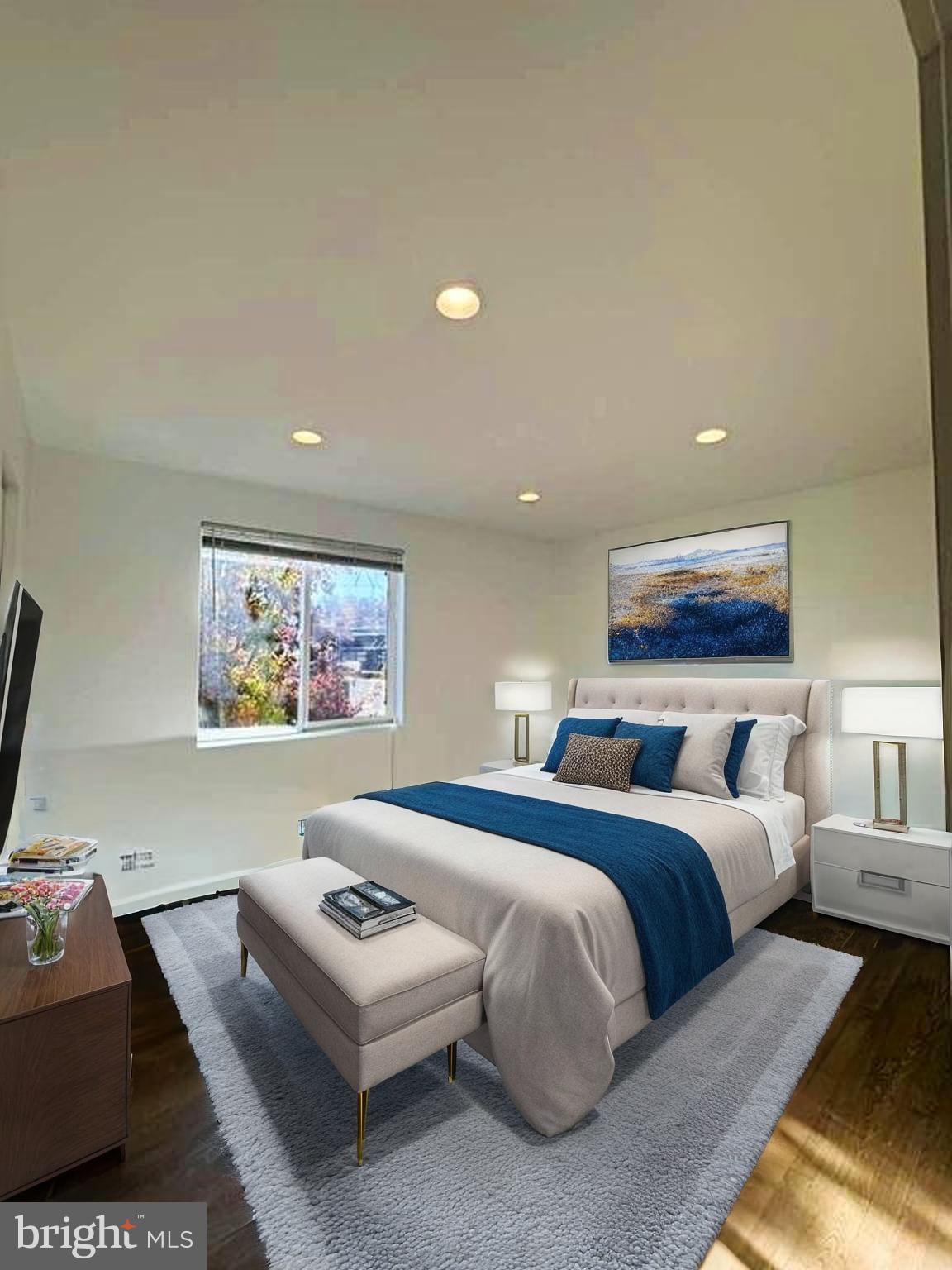 137 West Reed Avenue Alexandria, VA 22305 - Photo 12 of 16 a bedroom with a bed and a couch