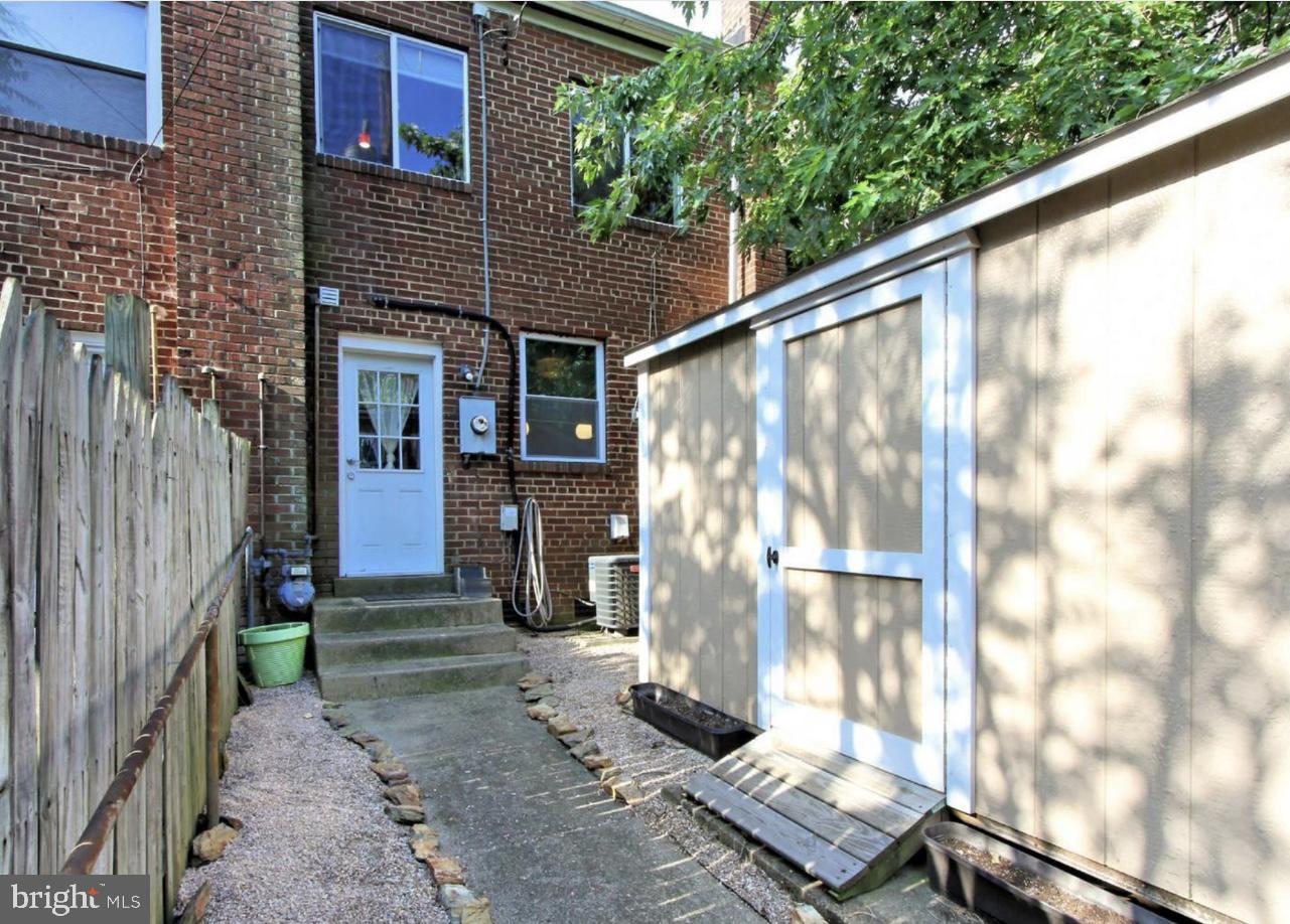 137 West Reed Avenue Alexandria, VA 22305 - Photo 16 of 16 a front view of a house with a yard