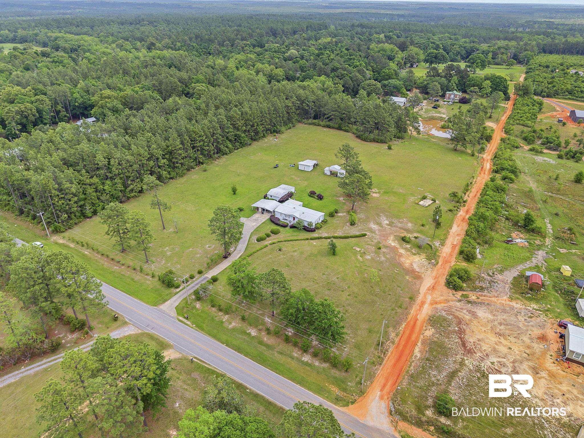 29792 County Road 65 Loxley, AL 36551 - Photo 23 of 39 Birds eye view of property with a rural view and a forest view