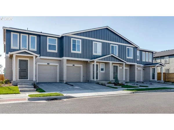 a black white building with a outdoor space