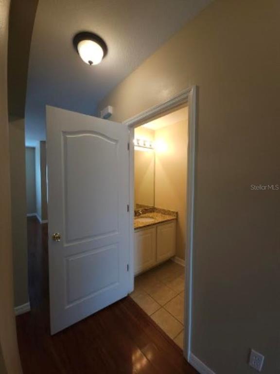 15662 Stable Run Drive Spring Hill, FL 34610 - Photo 11 of 29 a bathroom with a bathtub and a sink