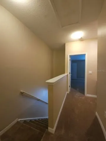 a room with a sink cabinets and utility room