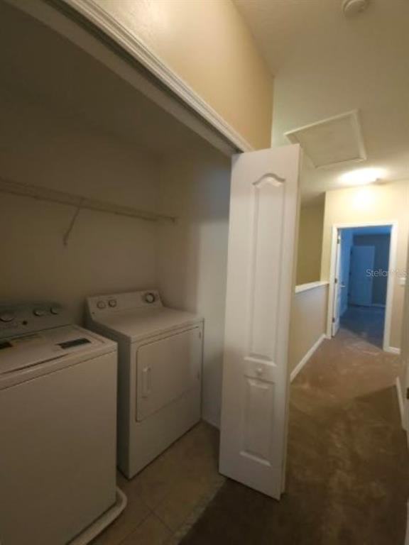 15662 Stable Run Drive Spring Hill, FL 34610 - Photo 17 of 29 a utility room with dryer and washer