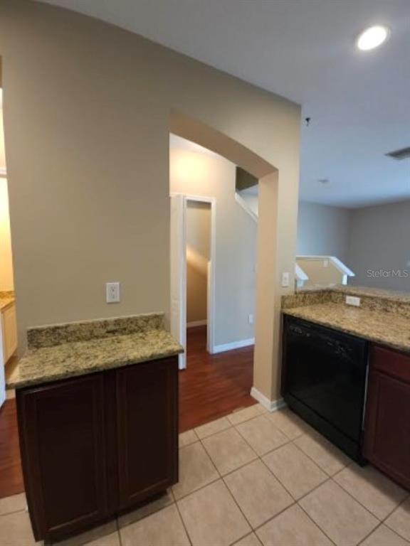 15662 Stable Run Drive Spring Hill, FL 34610 - Photo 10 of 29 a bathroom with a granite countertop sink and a mirror