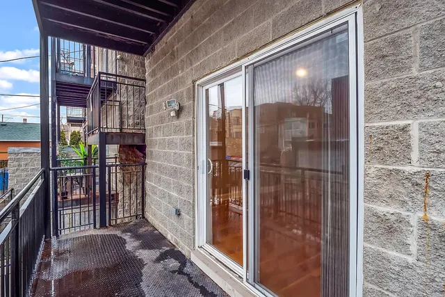 a view of gallery with balcony