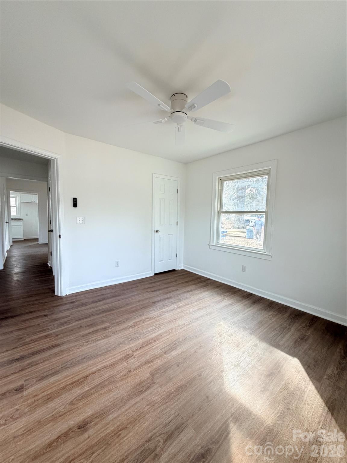 1114 Mt Olivet Road Kannapolis, NC 28083 - Photo 16 of 26 an empty room with wooden floor and windows