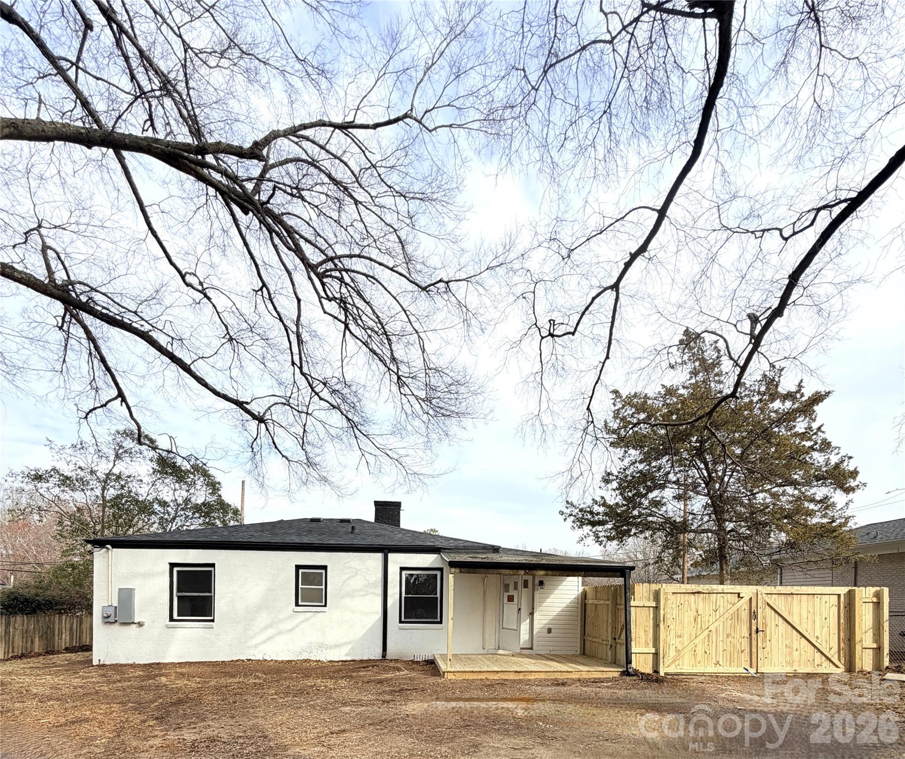1114 Mt Olivet Road Kannapolis, NC 28083 - Photo 24 of 26 a house that has tree in front of it