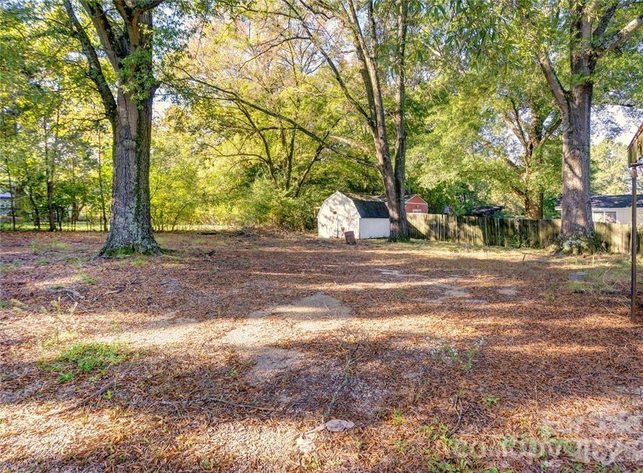 1114 Mt Olivet Road Kannapolis, NC 28083 - Photo 26 of 26 a view of a yard with tree s