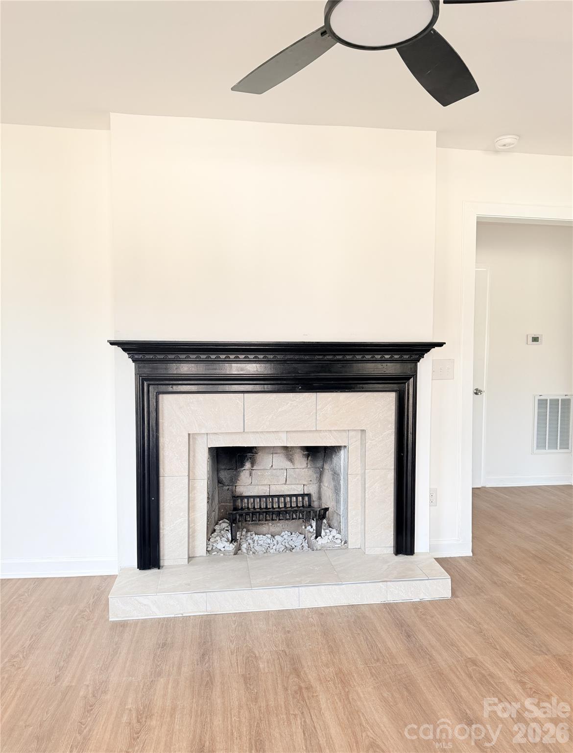 1114 Mt Olivet Road Kannapolis, NC 28083 - Photo 5 of 26 a living room with a fireplace