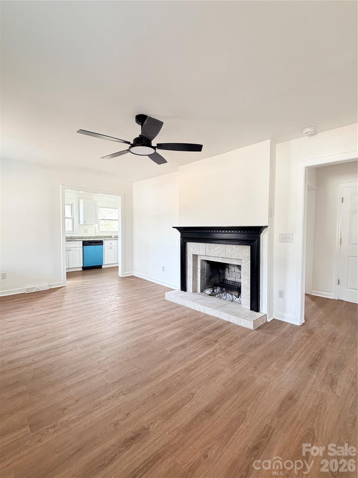 1114 Mt Olivet Road Kannapolis, NC 28083 - Photo 6 of 26 a view of empty room with a fireplace