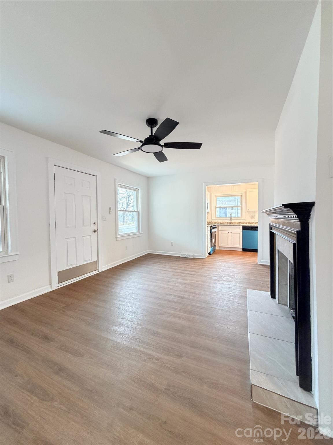 1114 Mt Olivet Road Kannapolis, NC 28083 - Photo 8 of 26 a view of livingroom with hardwood floor and a ceiling fan