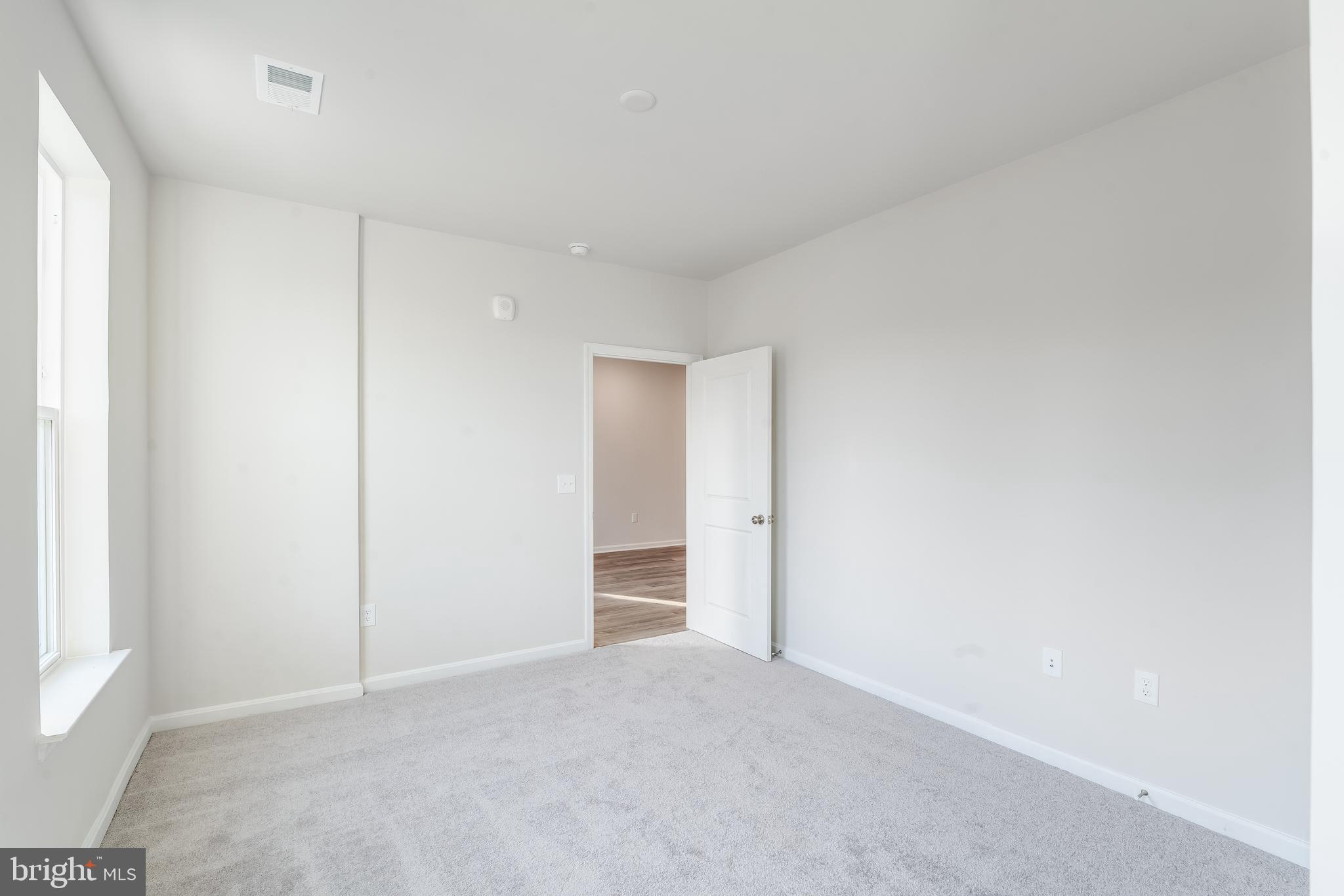 4003 Seaside Alder Road, Unit 201 ROSE Bowie, MD 20720 - Photo 10 of 16 a view of an empty room