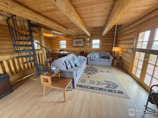a view of a chairs in wooden floor