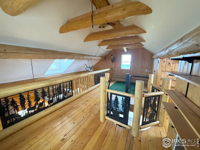 a view of a balcony with furniture