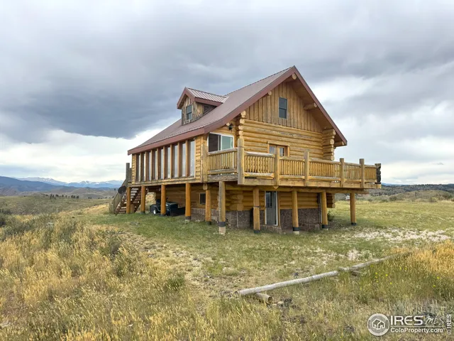 a view of a house with a ocean view