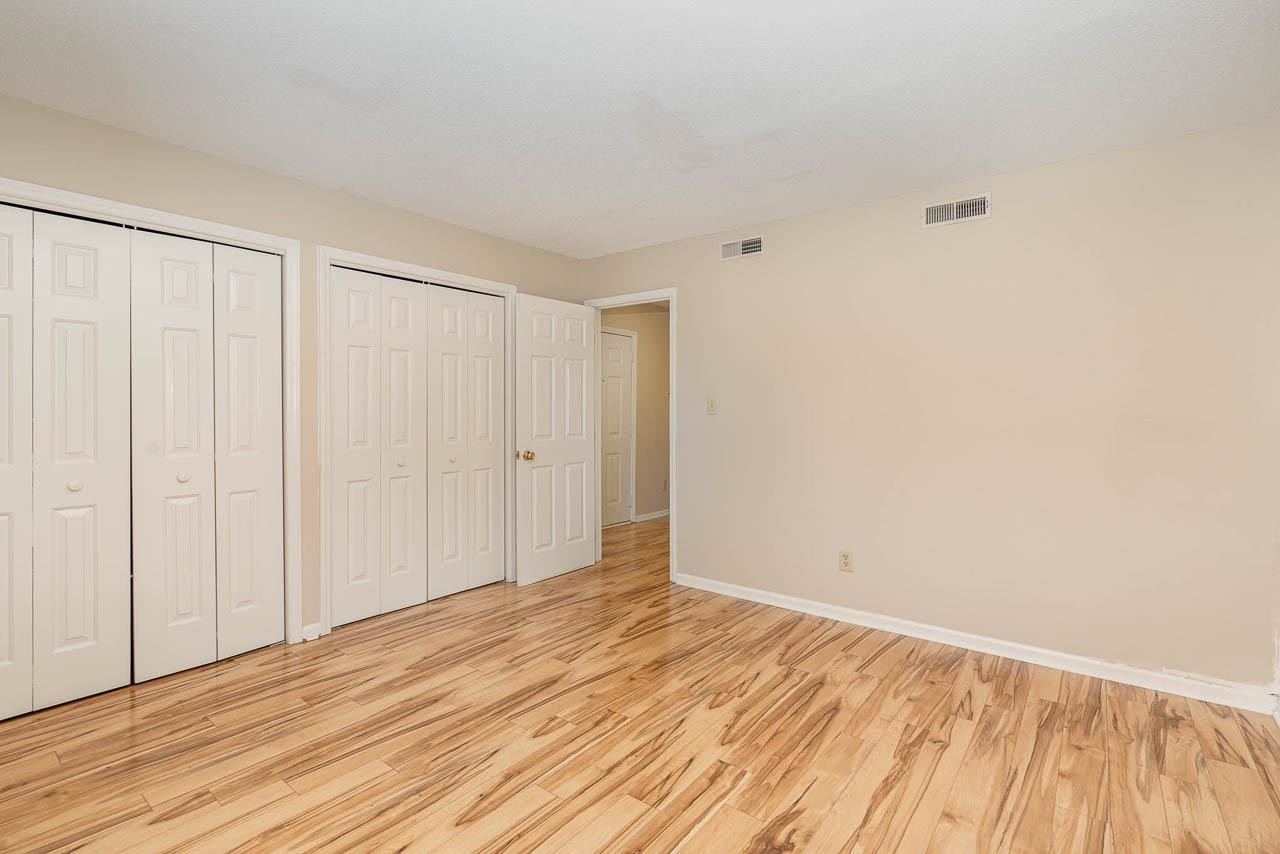 2820 Edridge Court, Unit 201 Raleigh, NC 27607 - Photo 15 of 22 Master Bedroom