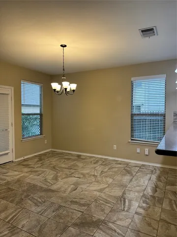 a view of an empty room with window