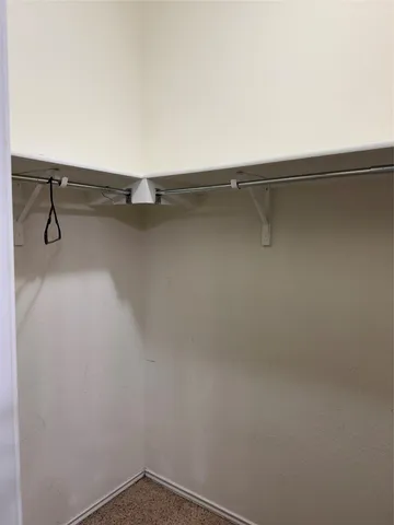 a bathroom with 2 sink and a mirror