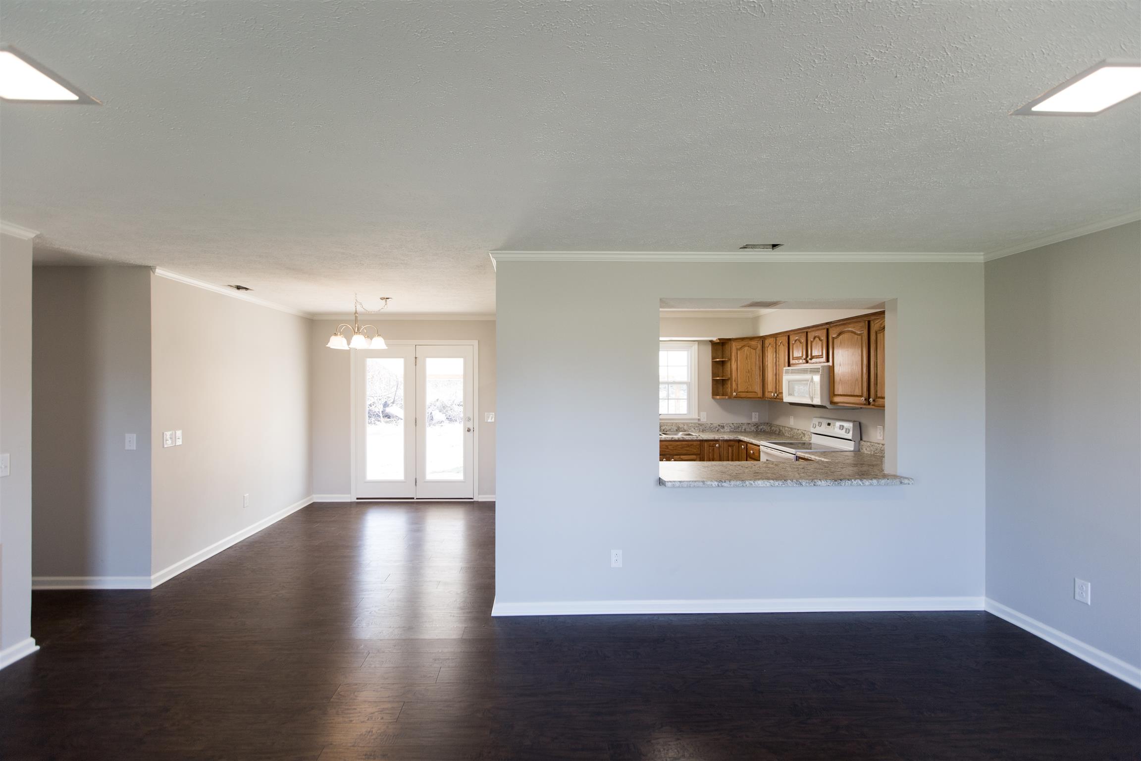 6339 Gum Station Road Springfield, TN 37172 - Photo 7 of 21 a view of a room with wooden floor and window