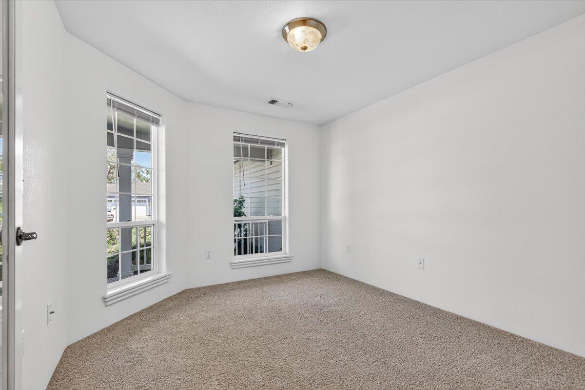 2618 Rabun Way Central Point, OR 97502 - Photo 11 of 42 an empty room with windows