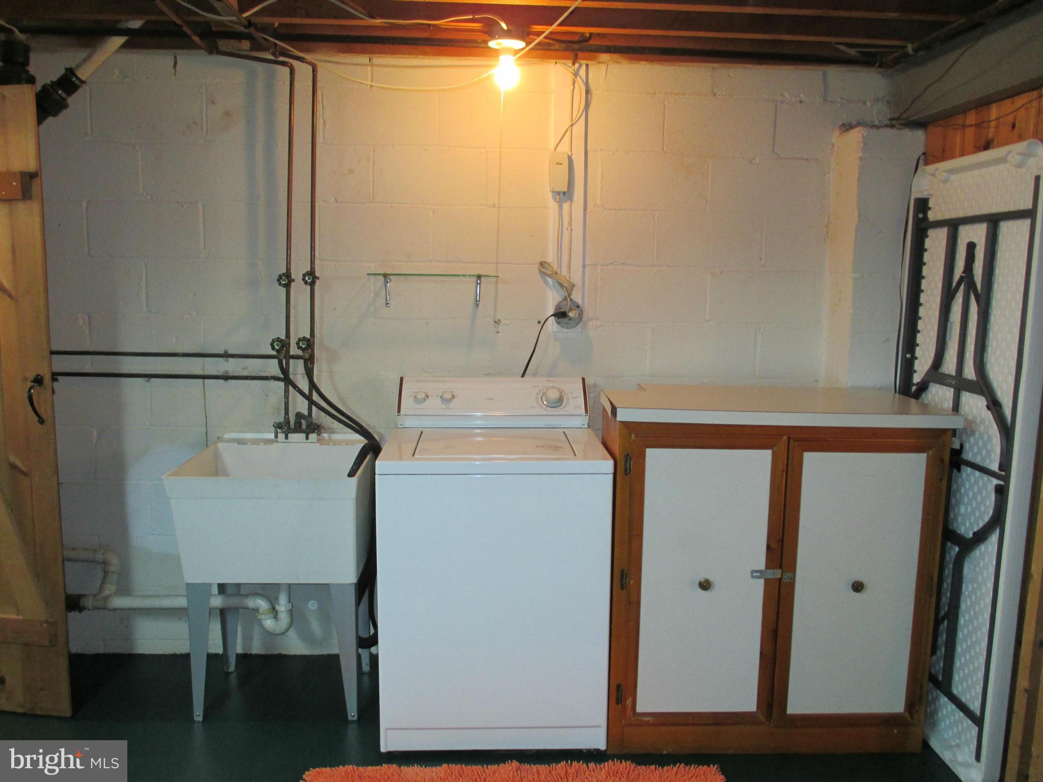211 Brandon Road Baltimore, MD 21212 - Photo 25 of 30 LAUNDRY CABINET STAYS
