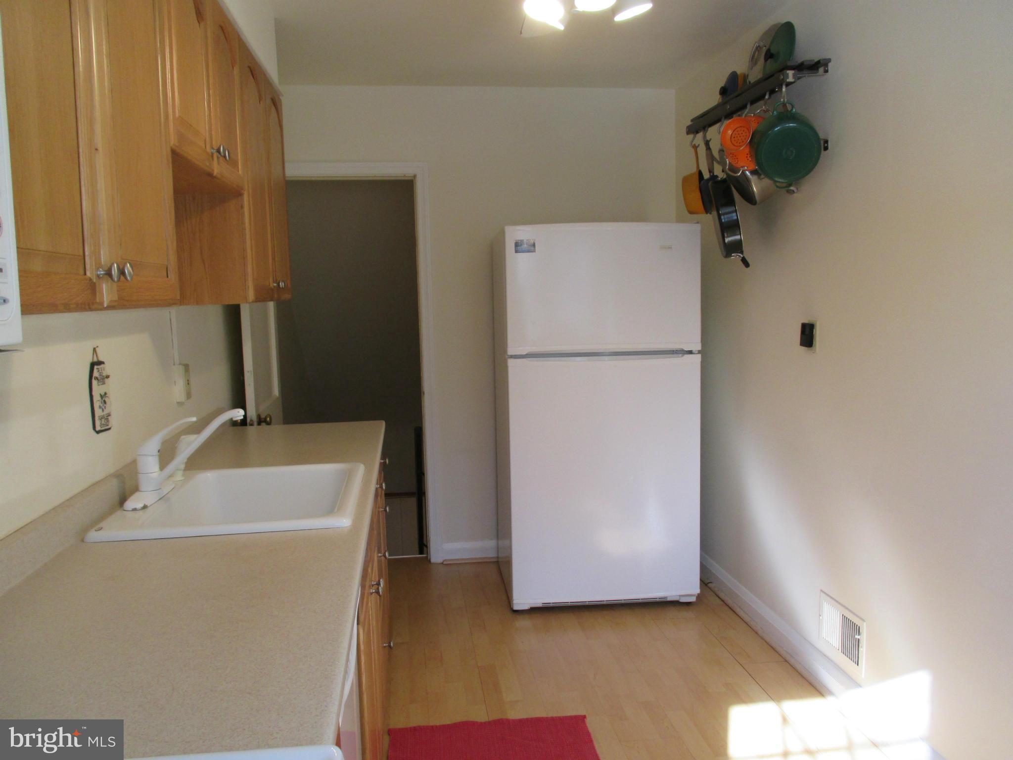 211 Brandon Road Baltimore, MD 21212 - Photo 10 of 30 AWESOME WALL SPACE W GOURMET POT RACK!