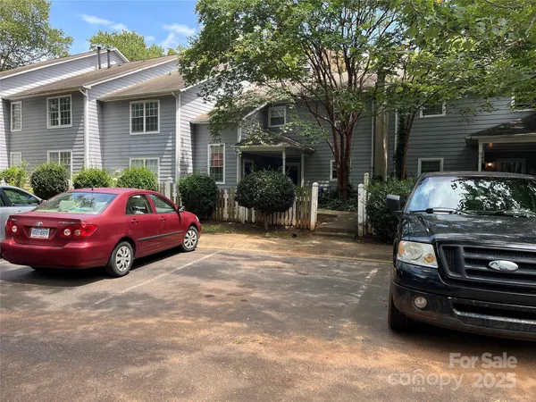 a car parked in front of a house