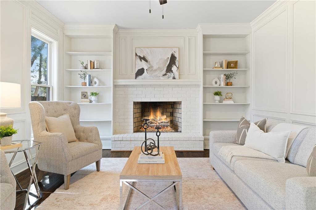 11125 Linbrook Lane Johns Creek, GA 30097 - Photo 25 of 44 a living room with furniture and a fireplace