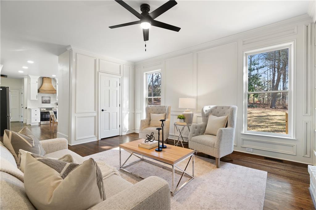 11125 Linbrook Lane Johns Creek, GA 30097 - Photo 26 of 44 a living room with furniture and a window