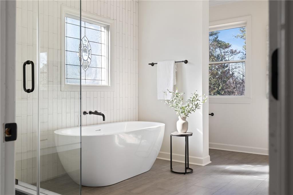 11125 Linbrook Lane Johns Creek, GA 30097 - Photo 29 of 44 a white bath tub sitting next to a window