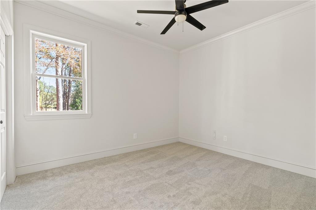 11125 Linbrook Lane Johns Creek, GA 30097 - Photo 34 of 44 an empty room with a window