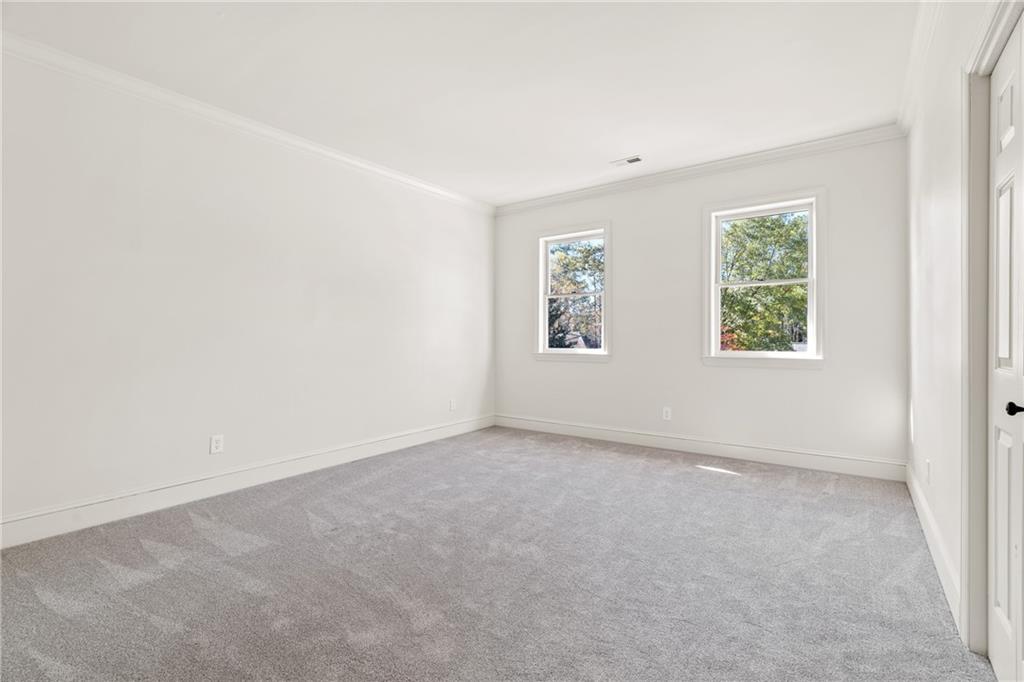11125 Linbrook Lane Johns Creek, GA 30097 - Photo 35 of 44 an empty room with windows