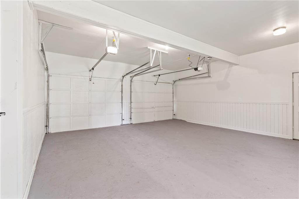 11125 Linbrook Lane Johns Creek, GA 30097 - Photo 39 of 44 a view of a room with racks on the wall