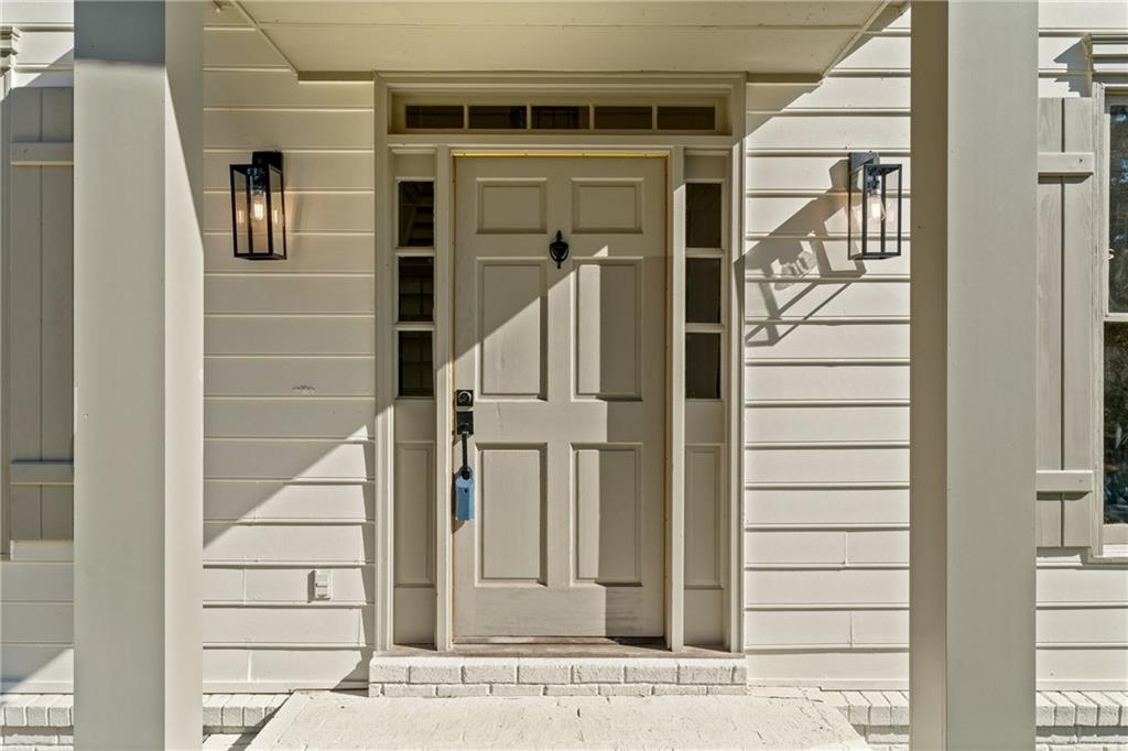 11125 Linbrook Lane Johns Creek, GA 30097 - Photo 8 of 44 a view of a entryway door of the house