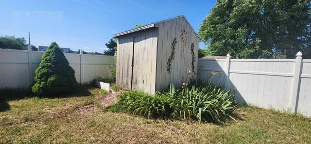 2402 Octopus Road Greenbackville, VA 23356 - Photo 20 of 21 a view of a back yard of the house