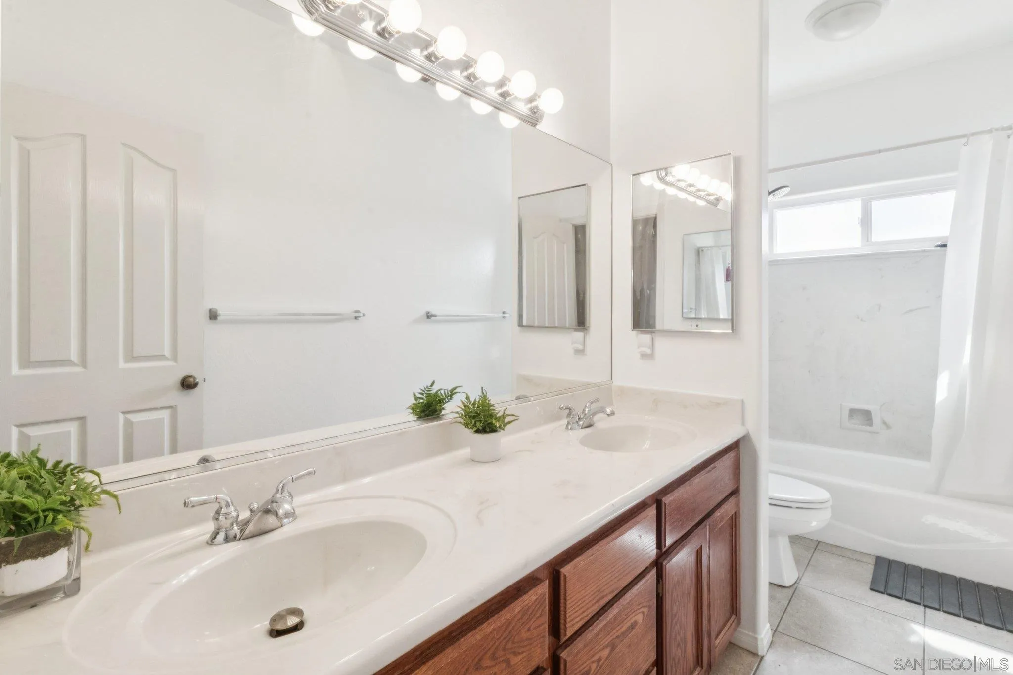 1346 Wilson Road Ramona, CA 92065 - Photo 33 of 71 Double sink in the bathroom in the Hallway, giving access to the two bedrooms one on each side of this spacious bathroom.