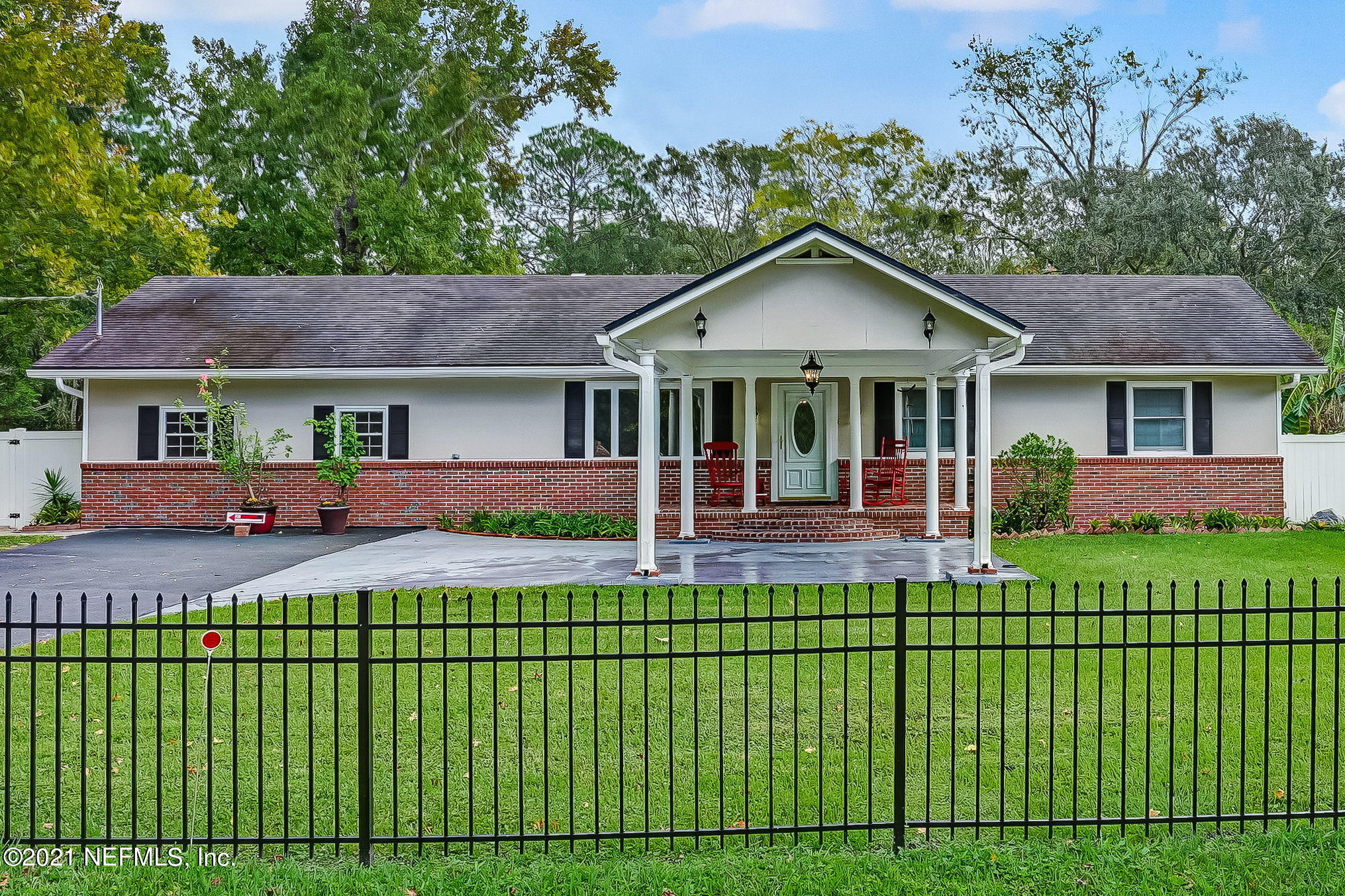 12957 Mandarin Road Jacksonville, FL 32223 - Photo 1 of 83 a view of a house with a yard patio and large tree