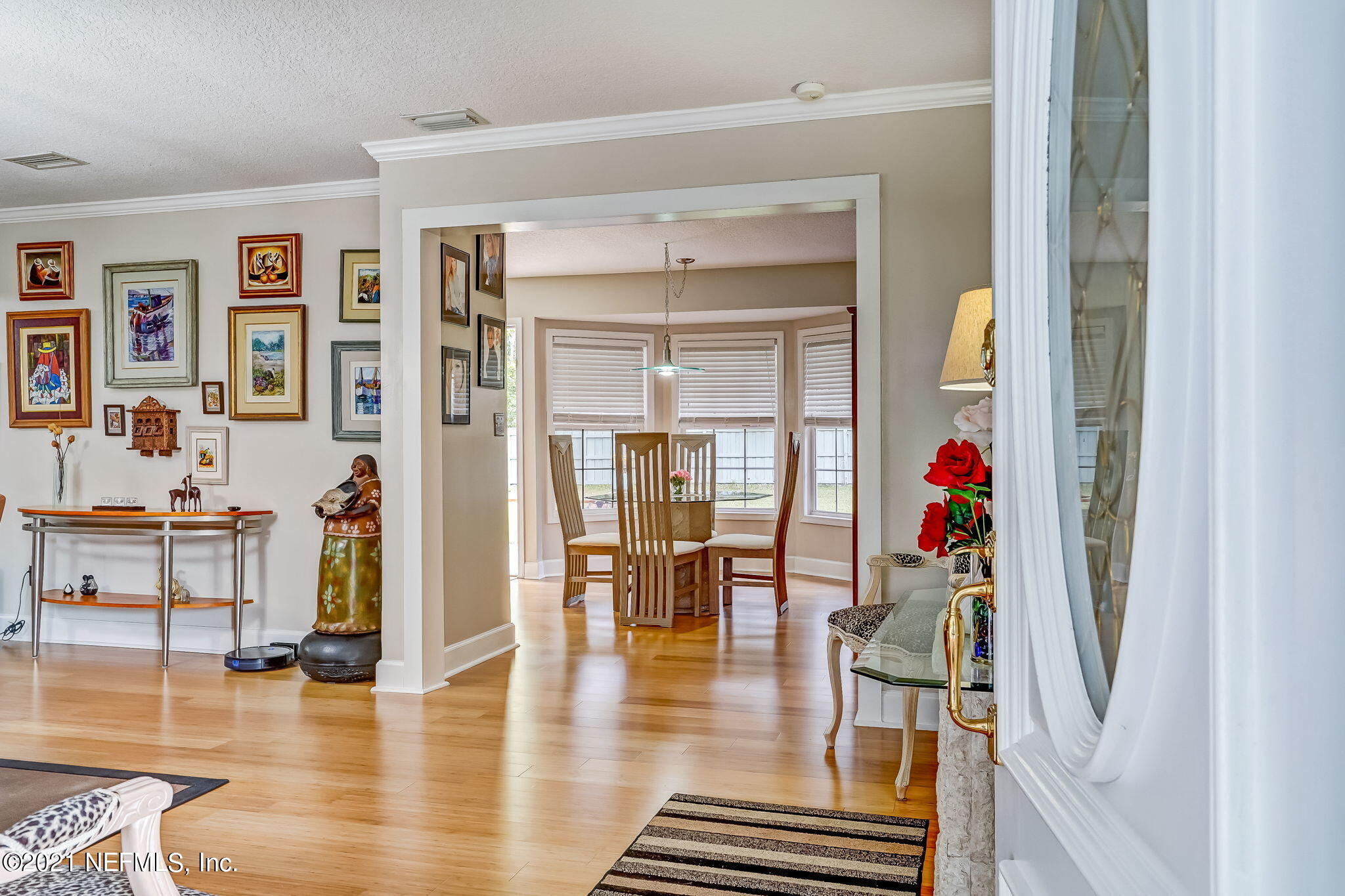 12957 Mandarin Road Jacksonville, FL 32223 - Photo 24 of 83 a living room with furniture and wooden floor