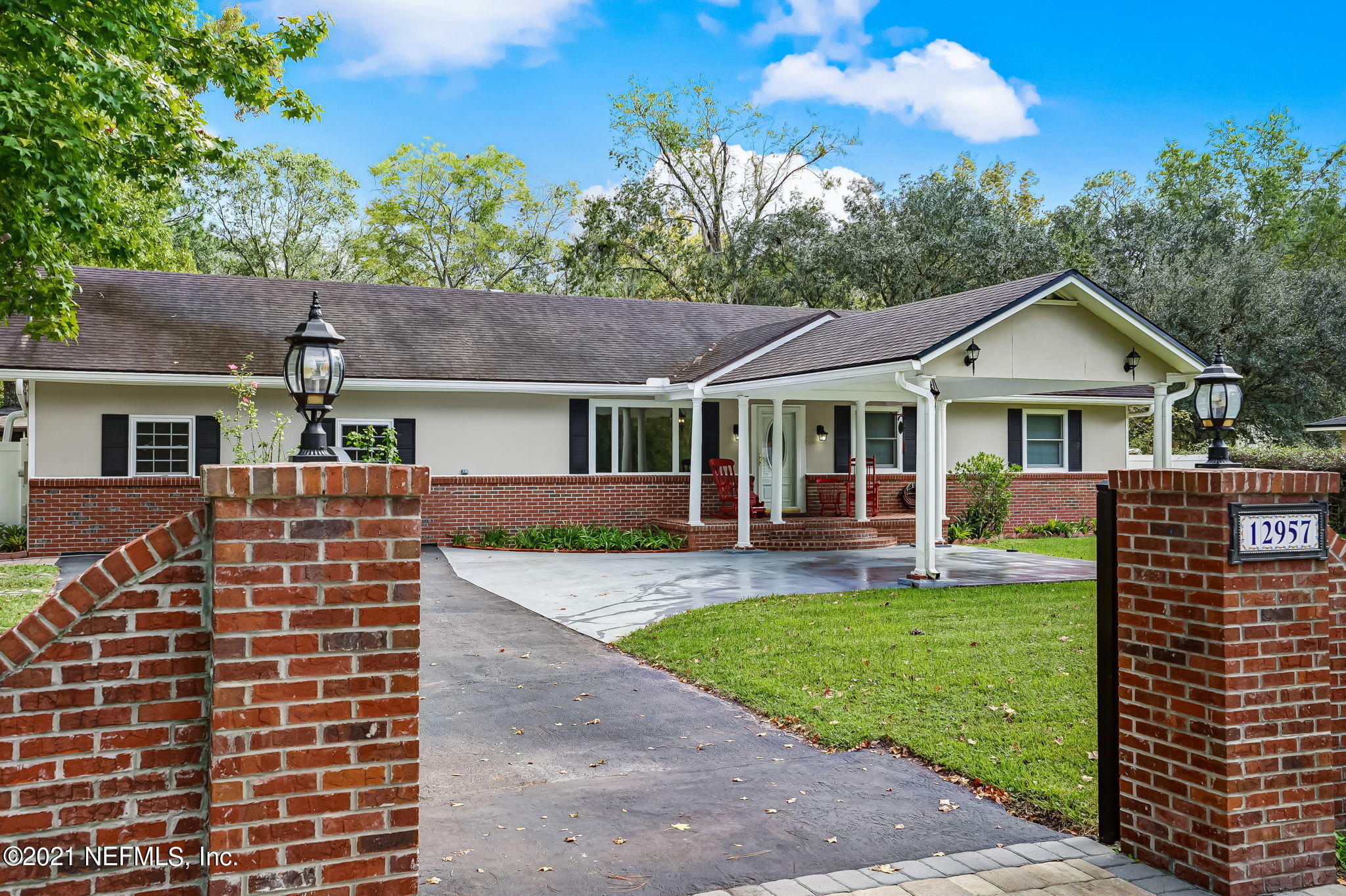12957 Mandarin Road Jacksonville, FL 32223 - Photo 5 of 83 front view of a house with a yard